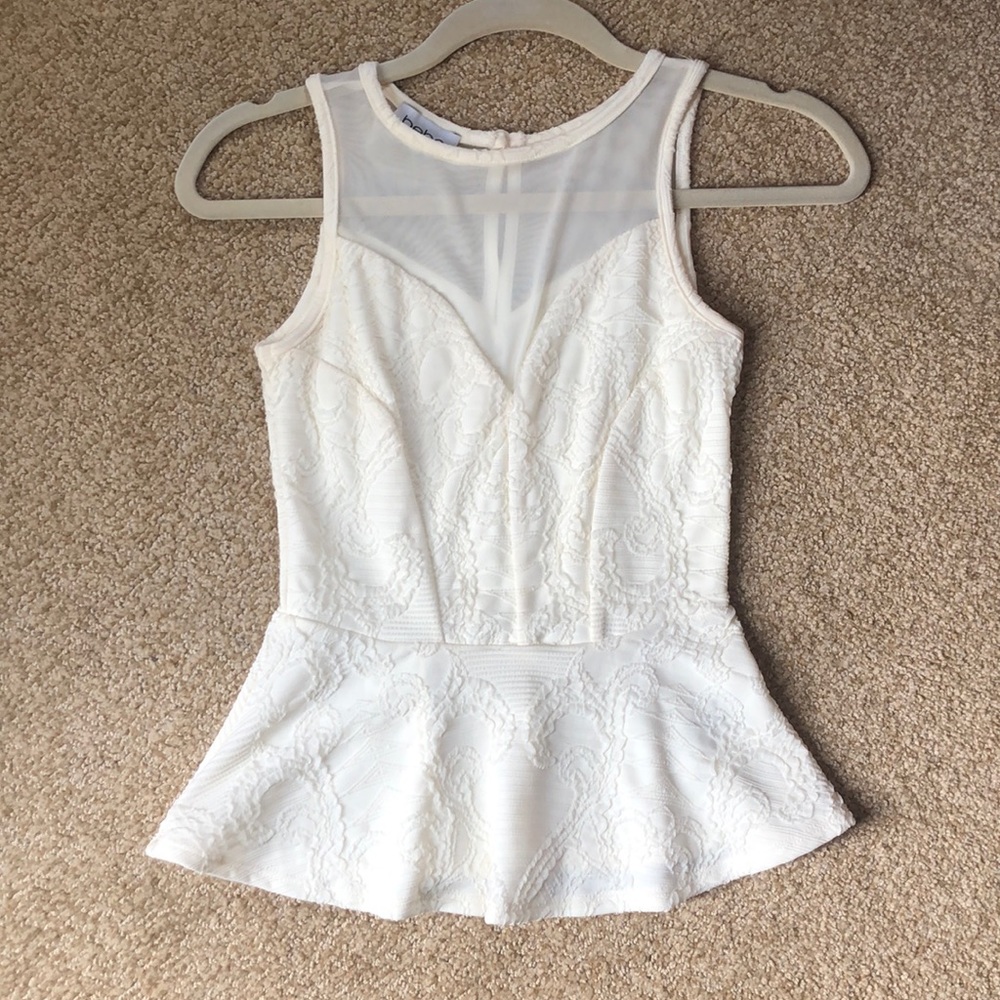 Off white Bebe peplum top with mesh detail